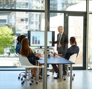 Boardroom window business people with presentation screen kpi analysis report solution office data analyst manager with conference trading portfolio investment growth